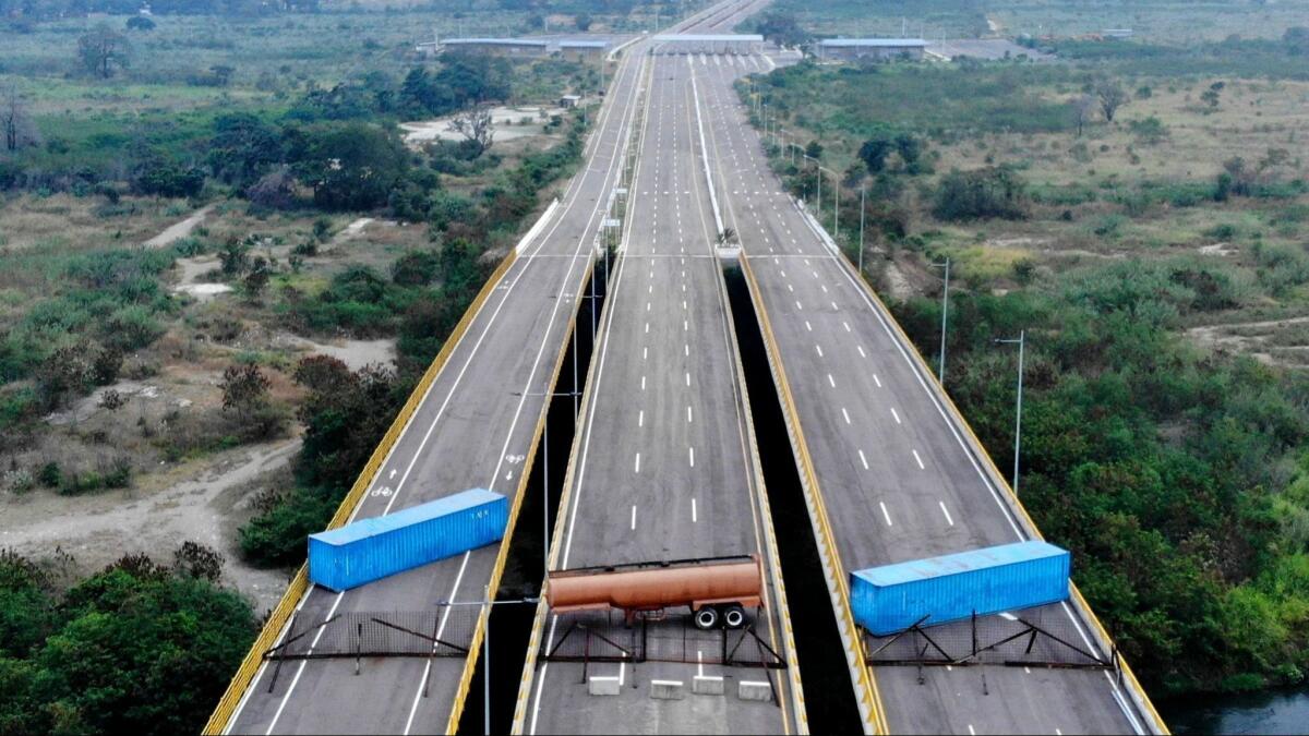 Venezuelan soldiers erected blockades on the Tienditas Bridge at a border crossing between Colombia and Venezuela.