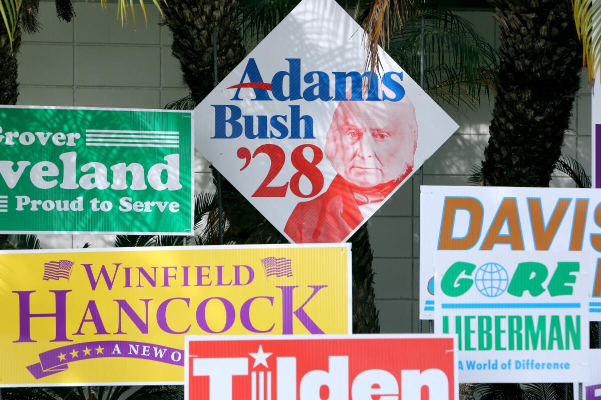 Mock campaign signs for John Adams, Grover Cleveland, Winfield Hancock, Al Gore and other failed candidates