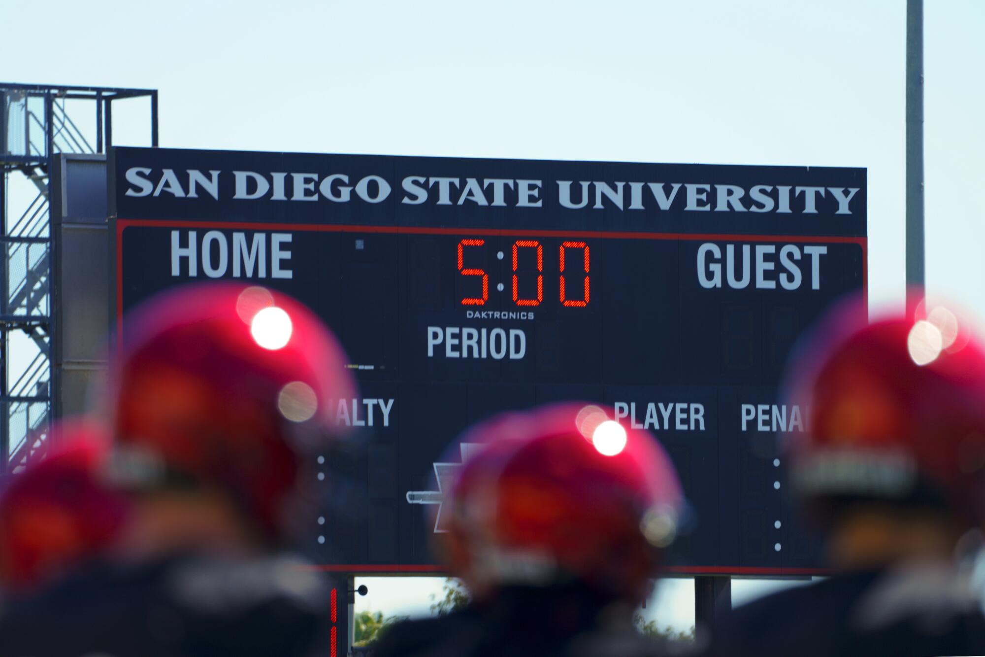 SDSU football team practices under scoreboard