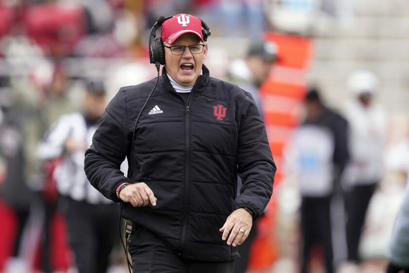 Indiana head coach Tom Allen talks with an official during the first half of an NCAA college football game against Rutgers, Saturday, Nov. 13, 2021, in Bloomington, Ind. (AP Photo/Darron Cummings)