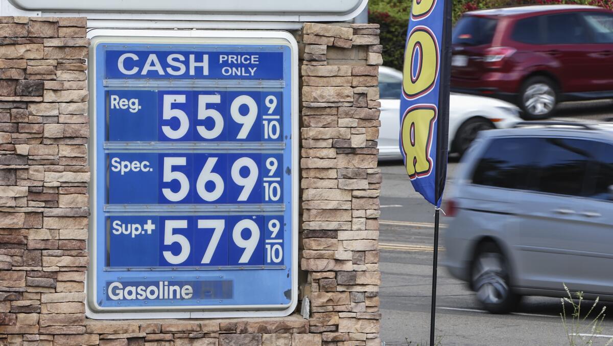 Gas prices are well above $5.00 per gallon at this Mobil gas station.