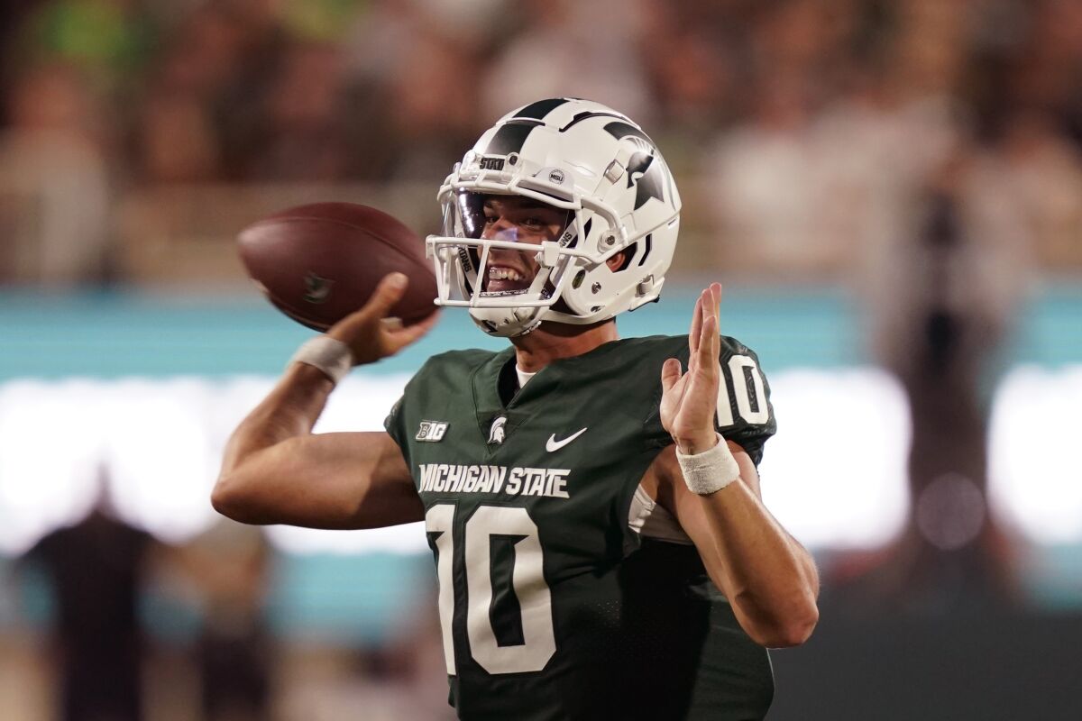 Michigan State quarterback Payton Thorne throws during the first half of an NCAA college football game against Western Michigan, Friday, Sept. 2, 2022, in East Lansing, Mich. (AP Photo/Carlos Osorio)