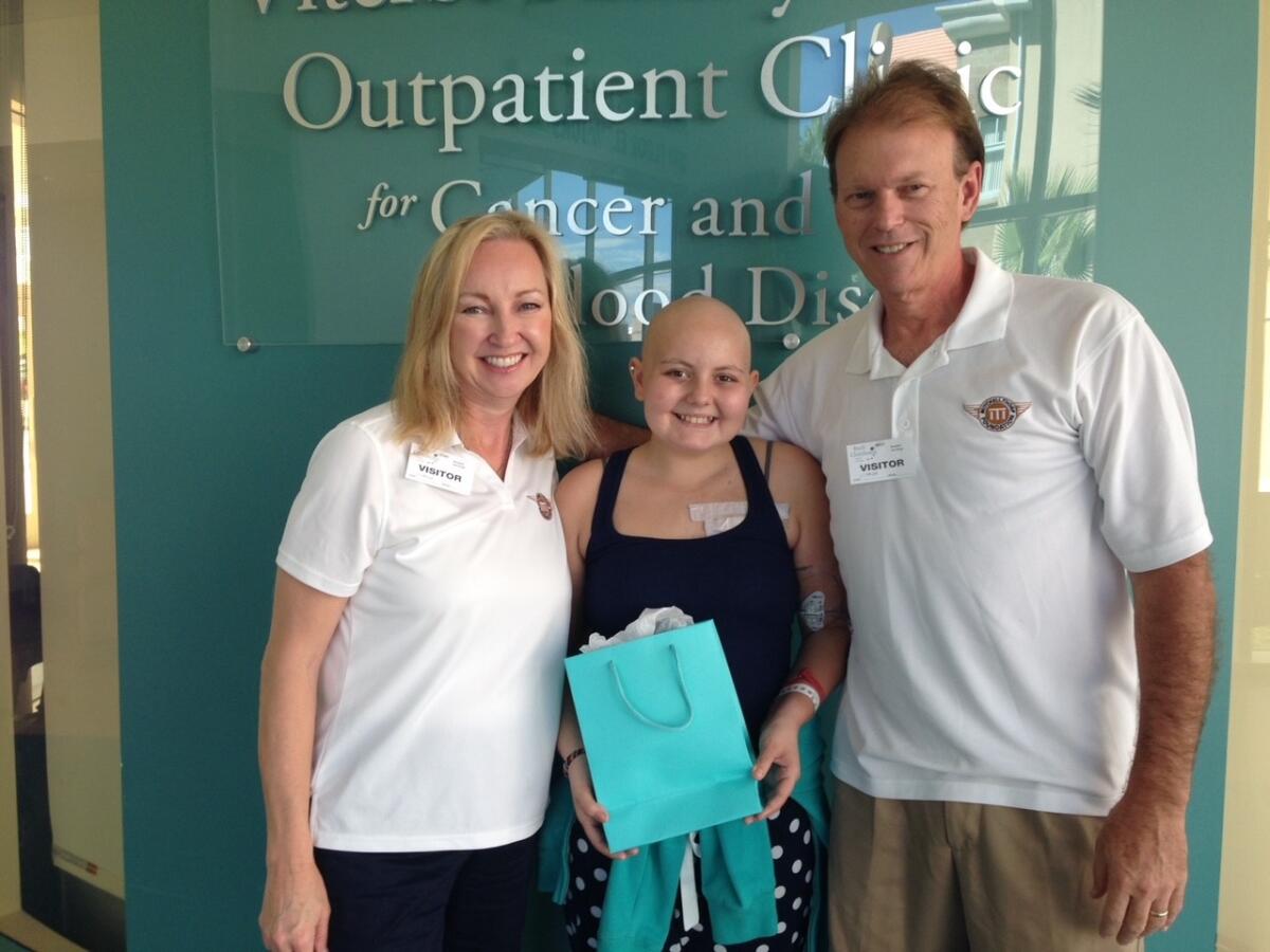 Beth and Brad Thorp with Sophia Christensen