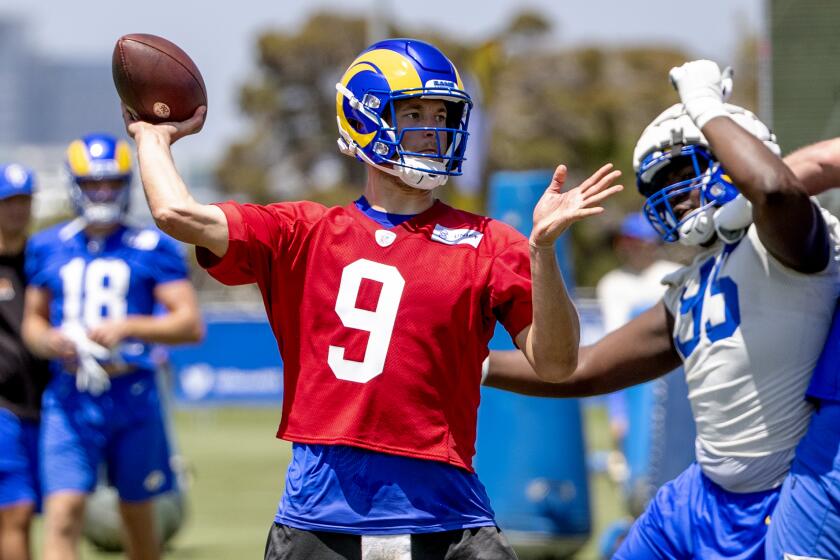 IRVNE, CA - JULY 24, 2022: Rams quarterback Matthew Stafford makes a pass during training camp.