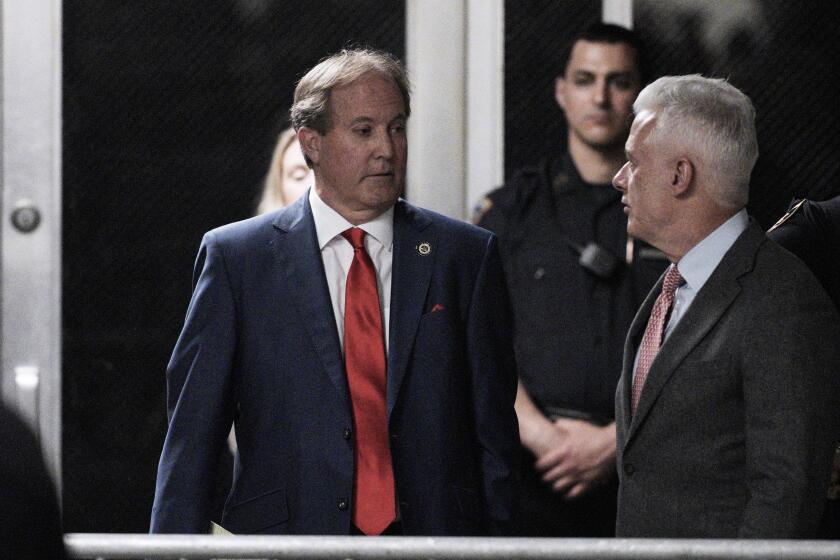Texas Attorney General Ken Paxton arrives with former President Donald Trump at Manhattan criminal court before Trump's trial in New York, Tuesday, April 30, 2024. (Curtis Means/Pool Photo via AP)