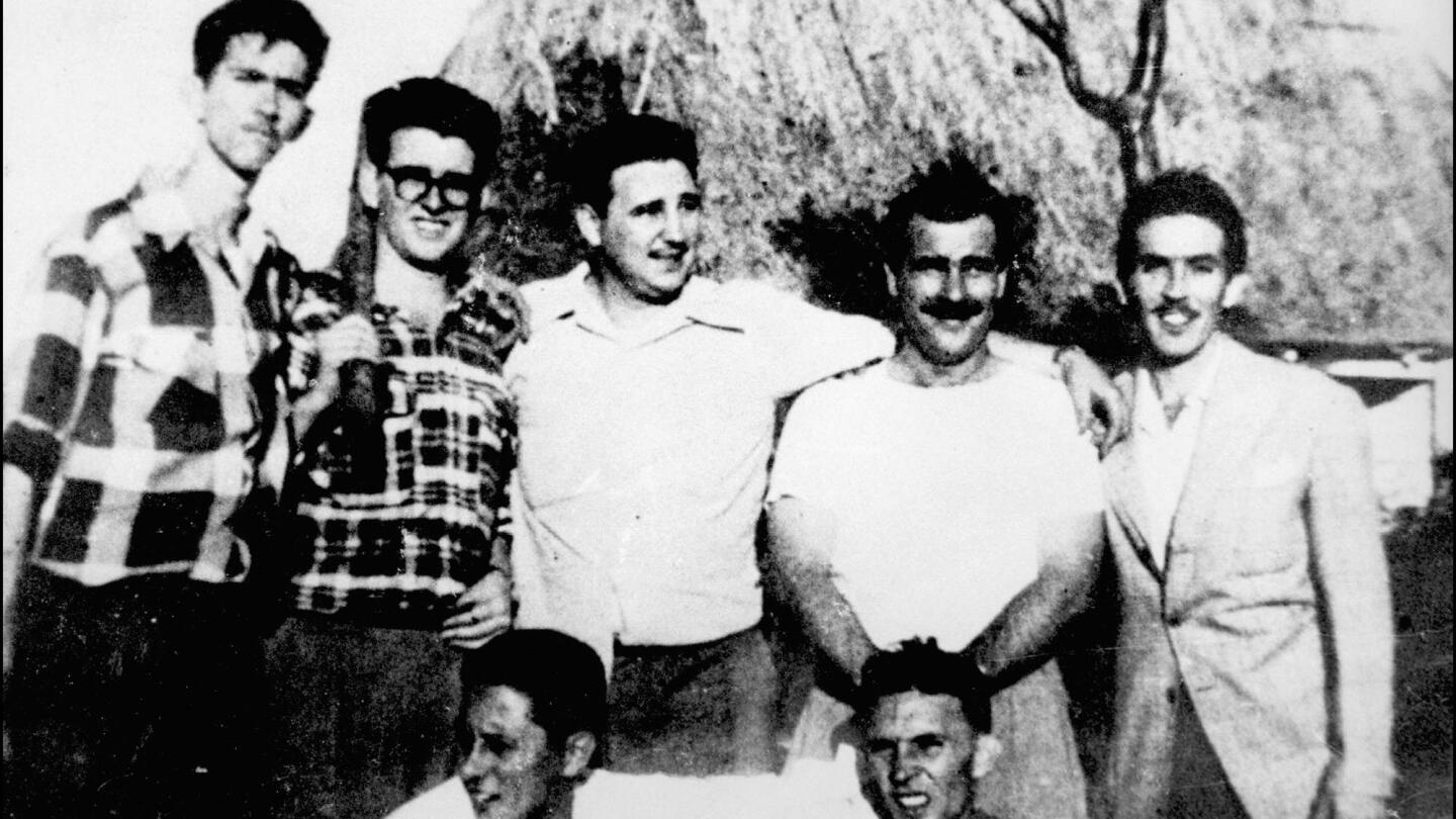 Standing, from left, are comrades Antonio "Nico" Lopez, Abel Santamaria, Fidel Castro, Jose Luis Tasende and Ernesto Tizol in Los Palos, Cuba, before the attack on the Moncada military barracks.
