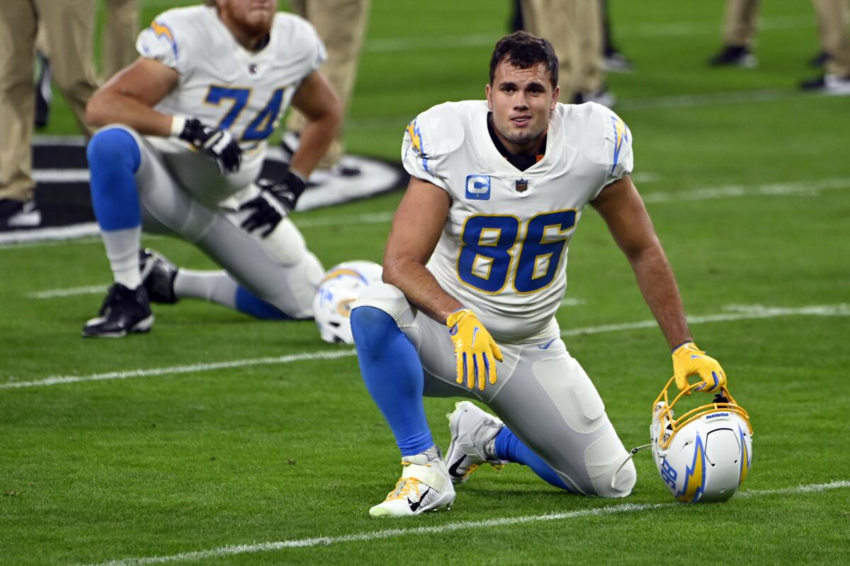 Chargers tight end Hunter Henry stretches before a game.