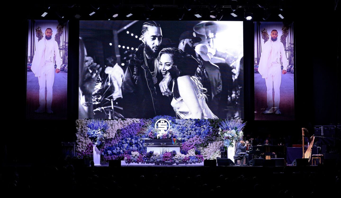 Stevie Wonder performs during the memorial.