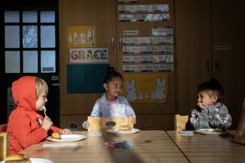 Warner Springs, California - April 10: Pre-K students Viggo Dicey, 4, left, Sofia Ramirez, 3, middle and Alana Espinoza, 3, eat breakfast at Warner Unified on Wednesday, April 10, 2024 in Warner Springs, California. The rural campus hasn't had clean drinking water for more than a decade because their well is contaminated with arsenic. The school is hoping for a new well but the State is considering connecting them to a water line of a small town nearby. The district worries about the cost and time of such plan. (Ana Ramirez / The San Diego Union-Tribune)