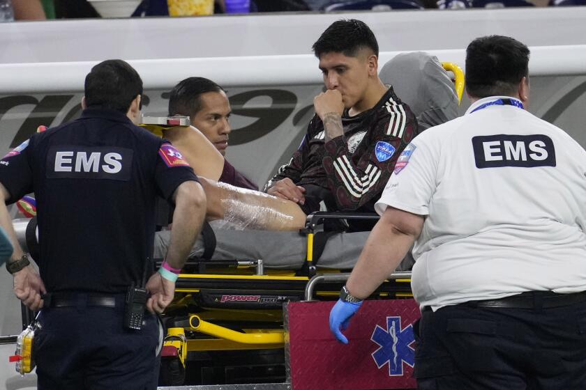 Mexico's Edson Alvarez is taken off the field on a stretcher after being injured during a Copa America Group B soccer match against Jamaica in Houston, Saturday, June 22, 2024. (AP Photo/David J. Phillip)