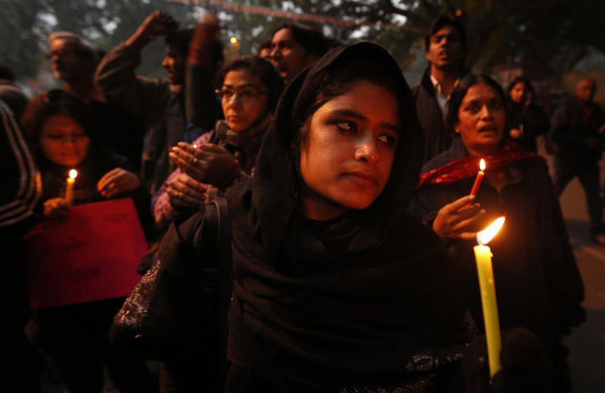 Indians holding a candlelight vigil Wednesday as the victim of a brutal gang rape in New Delhi continued to deteriorate. She died at a Singapore hospital early Saturday.