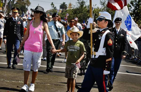 US military members march in full uniform at San Diego gay pride parade, LGBTQ+ rights