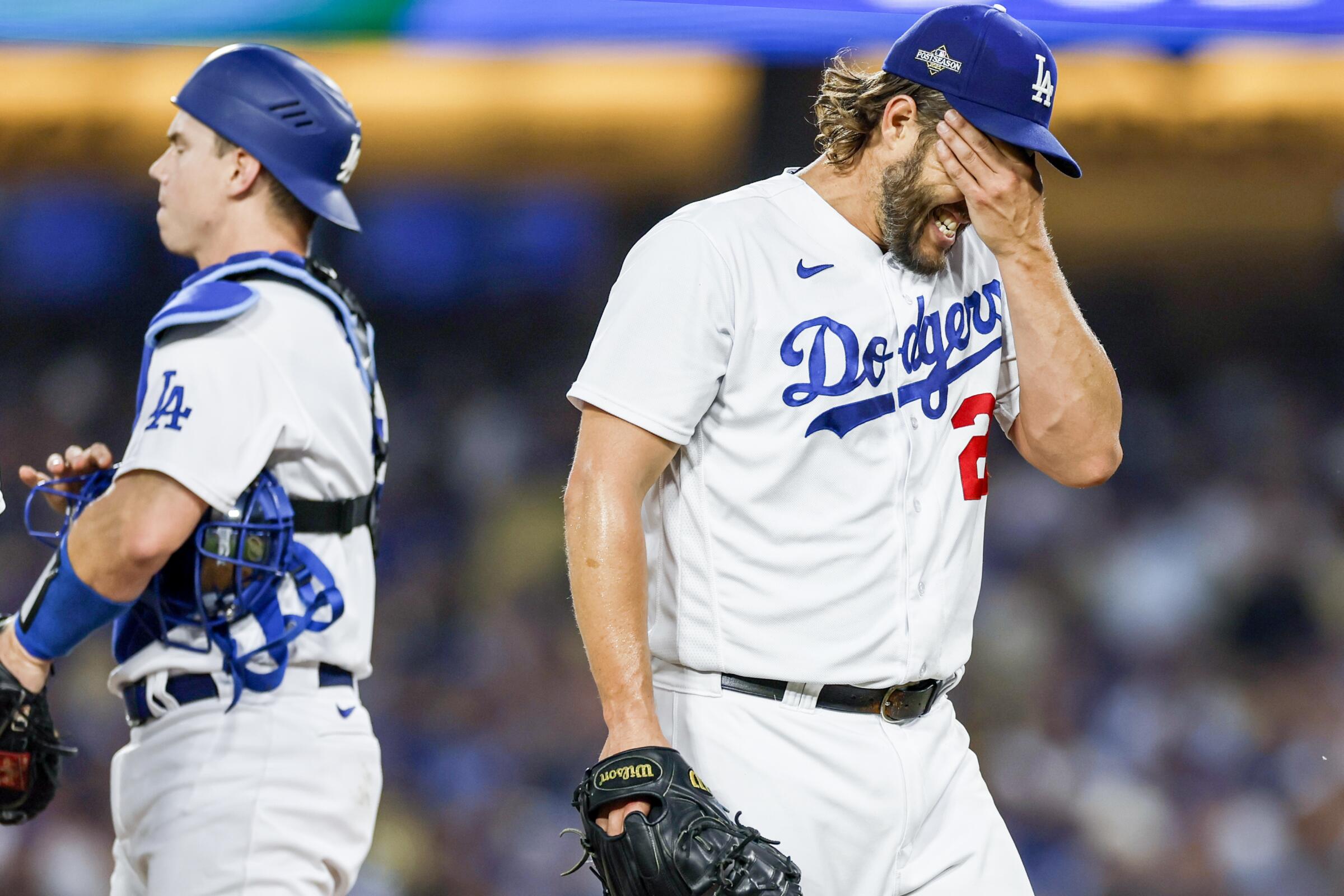 Dodgers starting pitcher Clayton Kershaw reacts after being pulled in the first inning of Game 1.