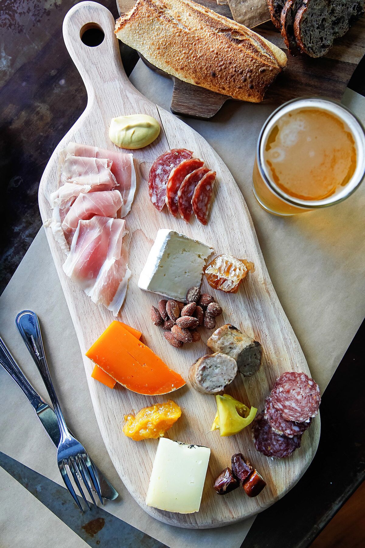 Executive Chef Joe Magnanelli at Cucina Urbana with his Charcuterie board with meats, cheeses and accompaniments in San Diego, California. (Eduardo Contreras/Union-Tribune)