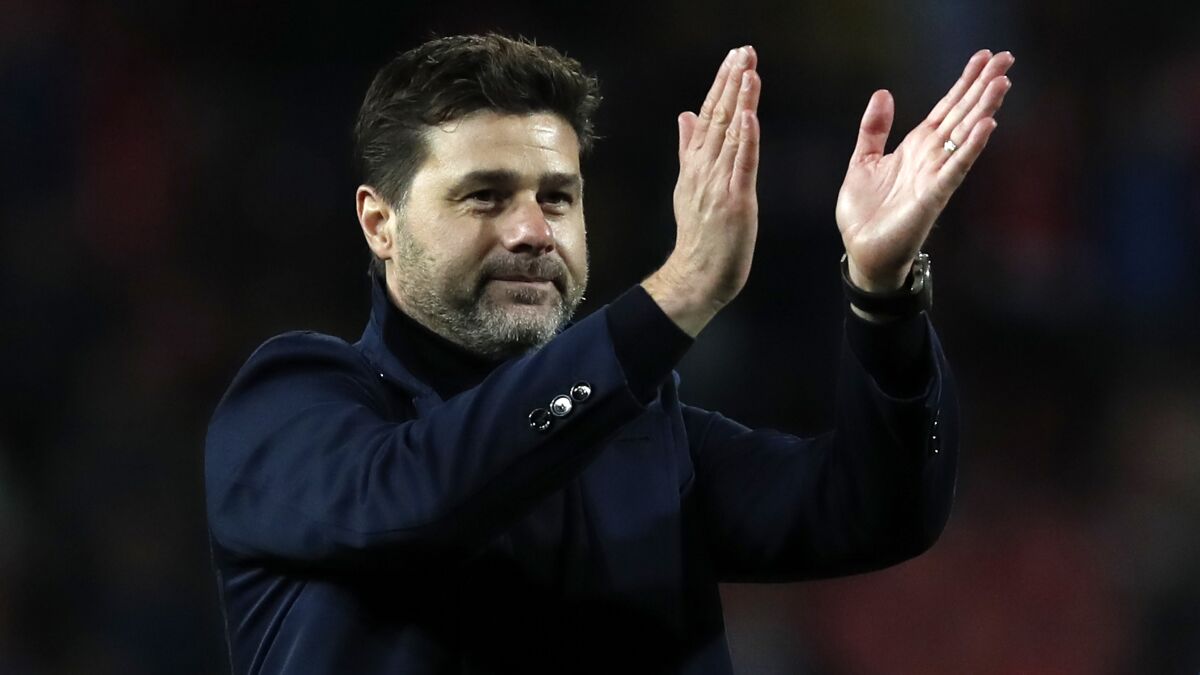 FILE - In this Wednesday, Nov. 6, 2019 file photo, Mauricio Pochettino applauds fans after the Champions League group B soccer match between Red Star and Tottenham, at the Rajko Mitic Stadium in Belgrade, Serbia. French champions Paris Saint-Germain have on Saturday, Jan. 2, 2021 announced the hiring of coach Mauricio Pochettino to replace the recently fired Thomas Tuchel. The 48-year-old Pochettino was manager of Tottenham in the Premier League for five years and led the Spurs to the Champions League final in 2019. (AP Photo/Darko Vojinovic, file)
