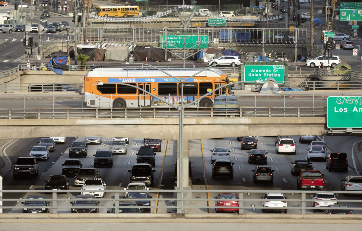 Afternoon traffic crawls along the 101 freeway through downtown Los Angeles in June of 2021.
