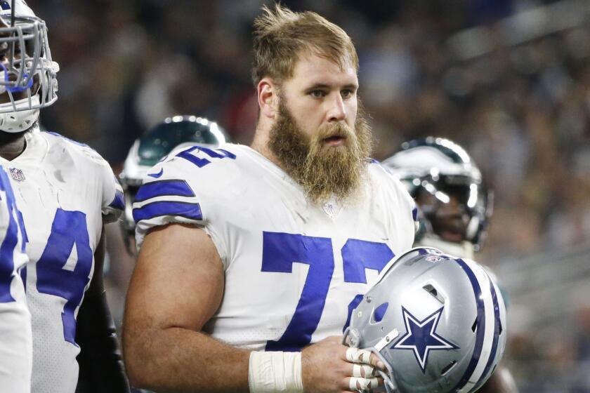 FILE - In this Nov. 19, 2017, file photo, Dallas Cowboys center Travis Frederick (72) rests during a timeout in the team's NFL football game against the Philadelphia Eagles in Arlington, Texas. Frederick said Wednesday, Aug. 22, 2018, that he has been diagnosed with a rare neurological disorder that causes weakness in various parts of the body, and the four-time Pro Bowl player isnât sure on a timetable for a return. Frederick says he has received two treatments for Guillain-Barre Syndrome over the past 48 hours and that the treatments will continue for several days. (AP Photo/Michael Ainsworth, File)