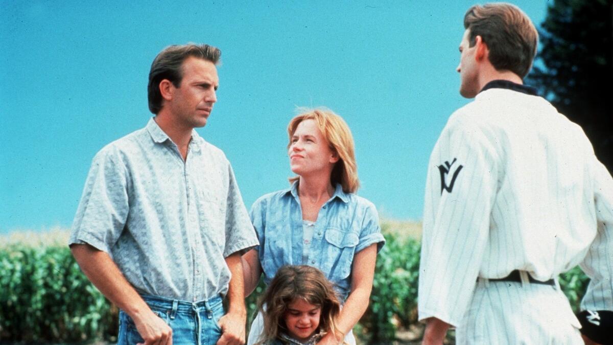 Kevin Costner, Amy Madigan and Gaby Hoffmann star in "Field of Dreams."