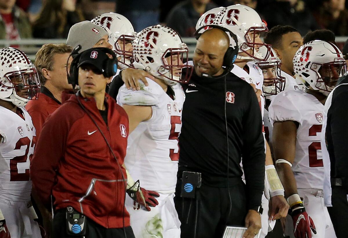 Stanford Coach David Shaw, center, and star running back Christian McCaffrey (5) will be featured Friday night in one of the first big games of the season.