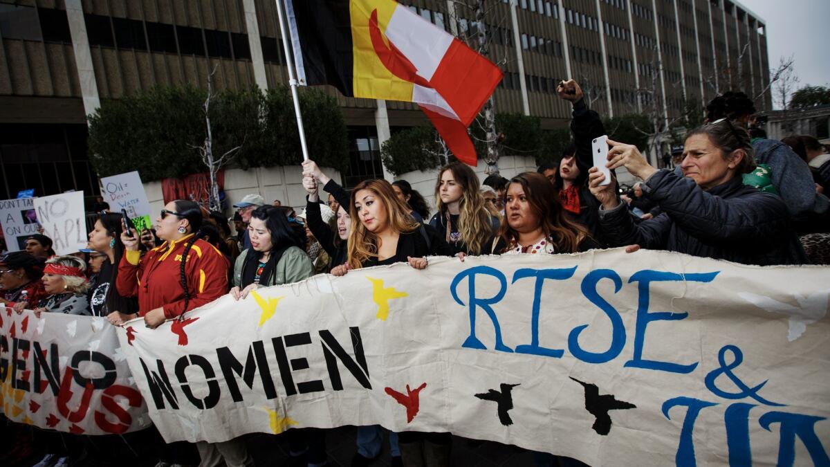 Thousands converged to protest the proposed $3.8-billion Dakota Access pipeline, which activists across the country say threatens the water supply and sacred sites of the Standing Rock Sioux Tribe in North Dakota, outside the Edward Roybal Federal Building in Los Angeles.