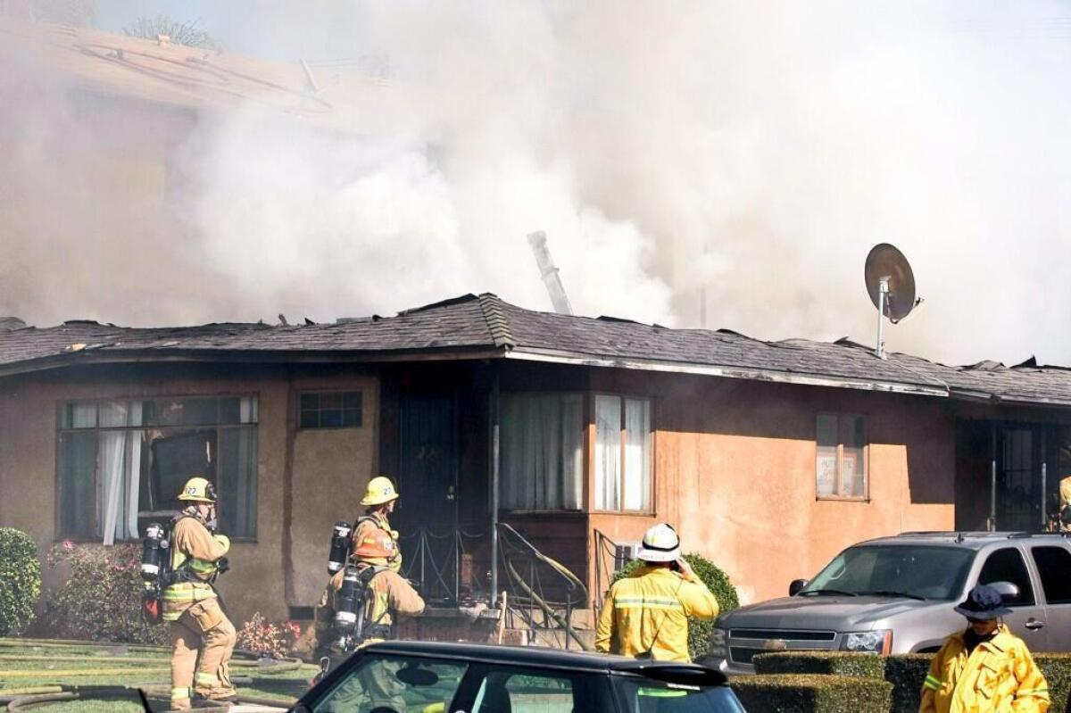 Firefighters were battling a blaze that engulfed a triplex in Burbank on Wednesday, March 12, 2014, in the 700 block of East Palm Avenue, just south of Glenoaks Boulevard.