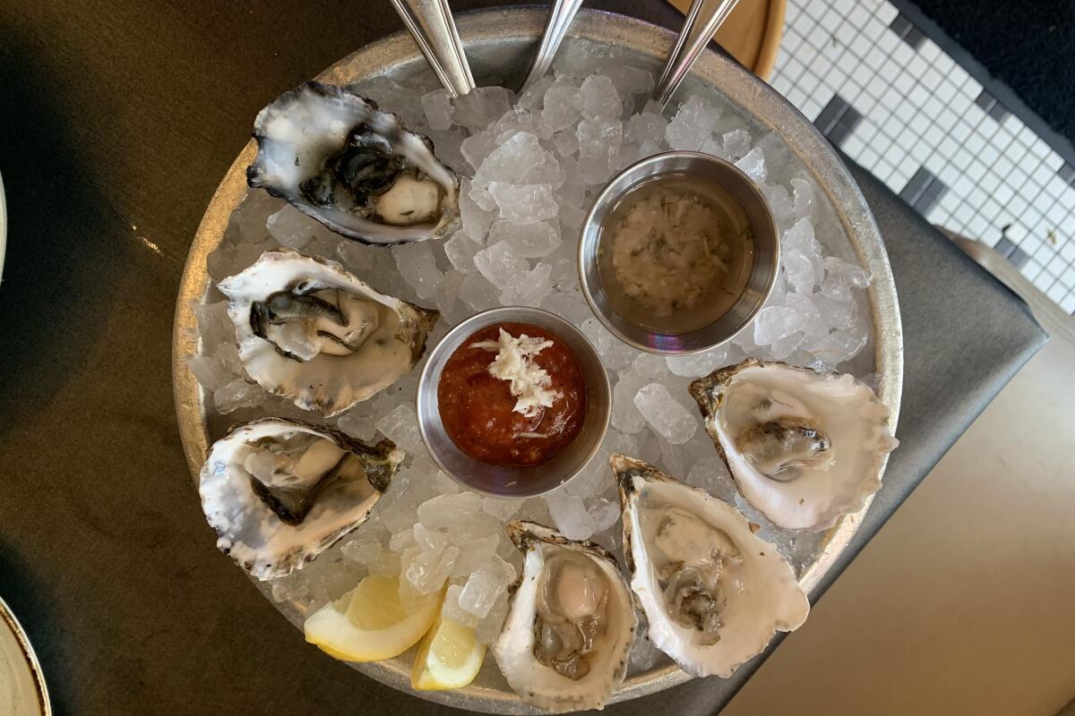 Santa Monica's Blue Plate Oysterette discounts oysters to $18 for a half-dozen during happy hour.