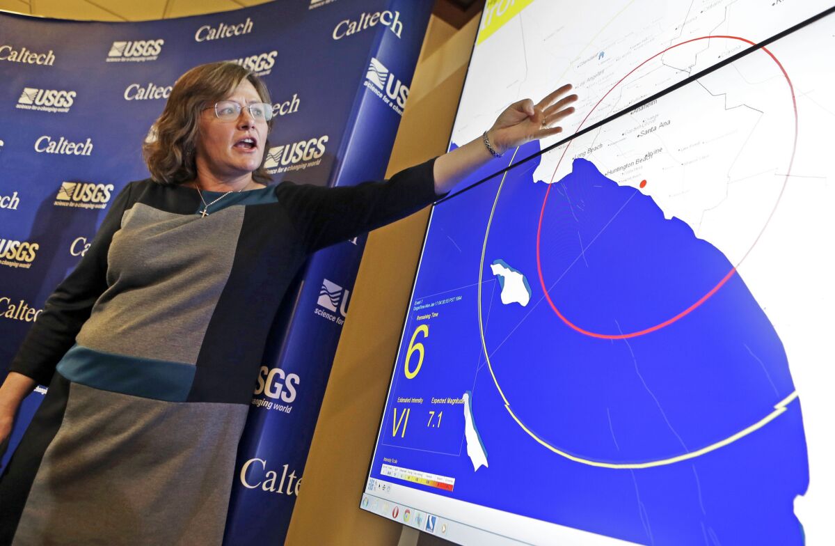 Dr. Lucy Jones, senior advisor for risk reduction for the U.S. Geological Survey, describes how an early warning system would provide advance warning of an earthquake, at a news conference at the California Institute of Technology in Pasadena.