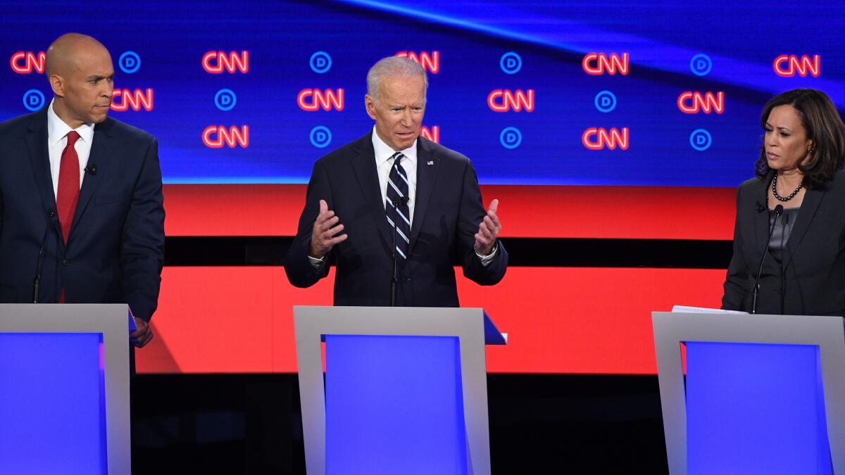 Democratic presidential hopeful Former Vice President Joe Biden (C) gestures as he speaks flanked by US Senator from California Kamala Harris (R) and US Senator from New Jersey Cory Booker during the second round of the second Democratic primary debate of the 2020 presidential campaign season hosted by CNN at the Fox Theatre in Detroit, Michigan on July 31, 2019. (Photo by Jim WATSON / AFP)JIM WATSON/AFP/Getty Images ** OUTS - ELSENT, FPG, CM - OUTS * NM, PH, VA if sourced by CT, LA or MoD **