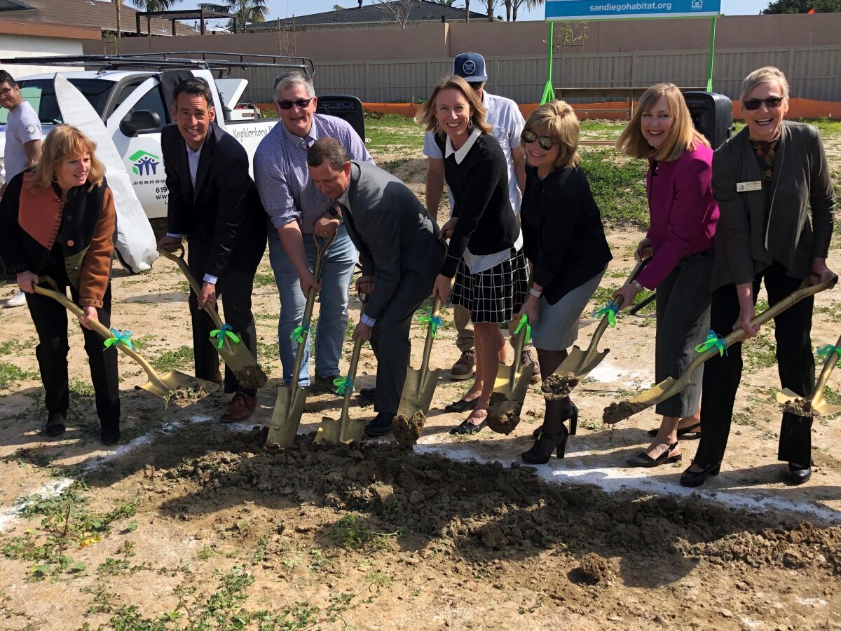 Local officials, including Encinitas Mayor Catherine Blakespear and council members, recently broke ground on the site of two habitat for humanity houses.