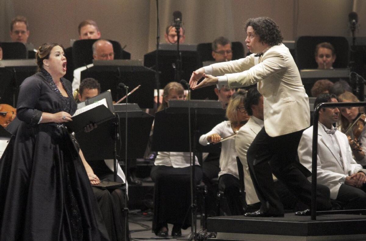 Julianna Di Giacomo and Gustavo Dudamel performing Verdi's Requiem with the Los Angeles Philharmonic at the Hollywood Bowl in 2013. The soprano will appear with Dudamel on Sunday at the Bowl in Leoncavallo's "Pagliacci" as part of a double bill with Mascagni's "Cavalleria Rusticana."
