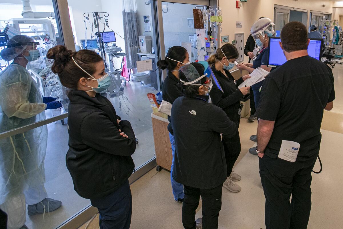 Coronavirus patients are housed in a makeshift ER unit in a tent at Arrowhead Regional Medical Center.