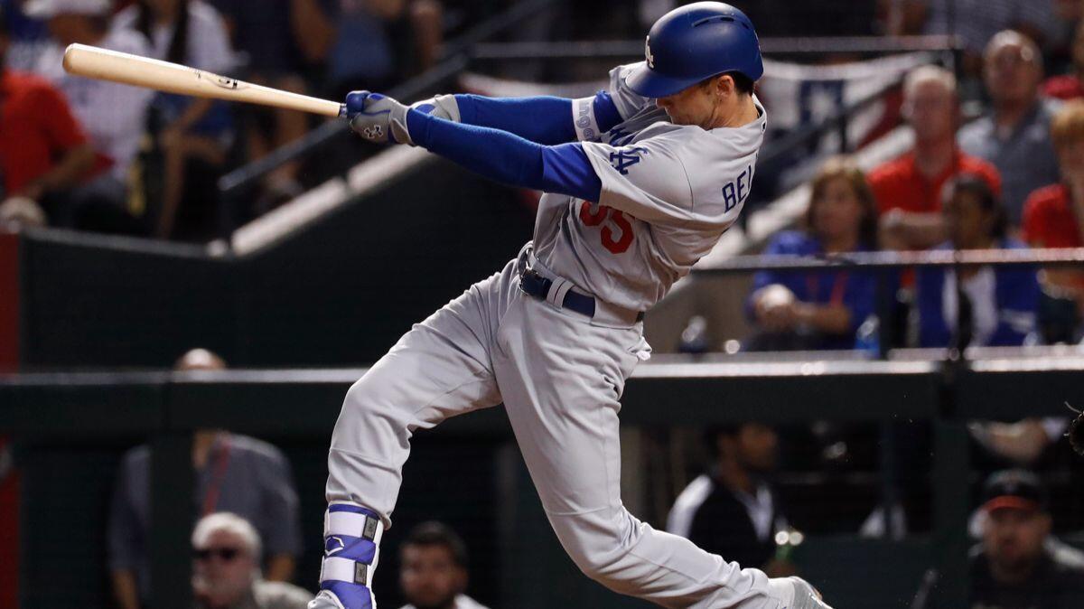 The Dodgers' Cody Bellinger connects for a solo home run during the fifth inning in Game 3 of the NLDS against the Arizona Diamondbacks on Monday.
