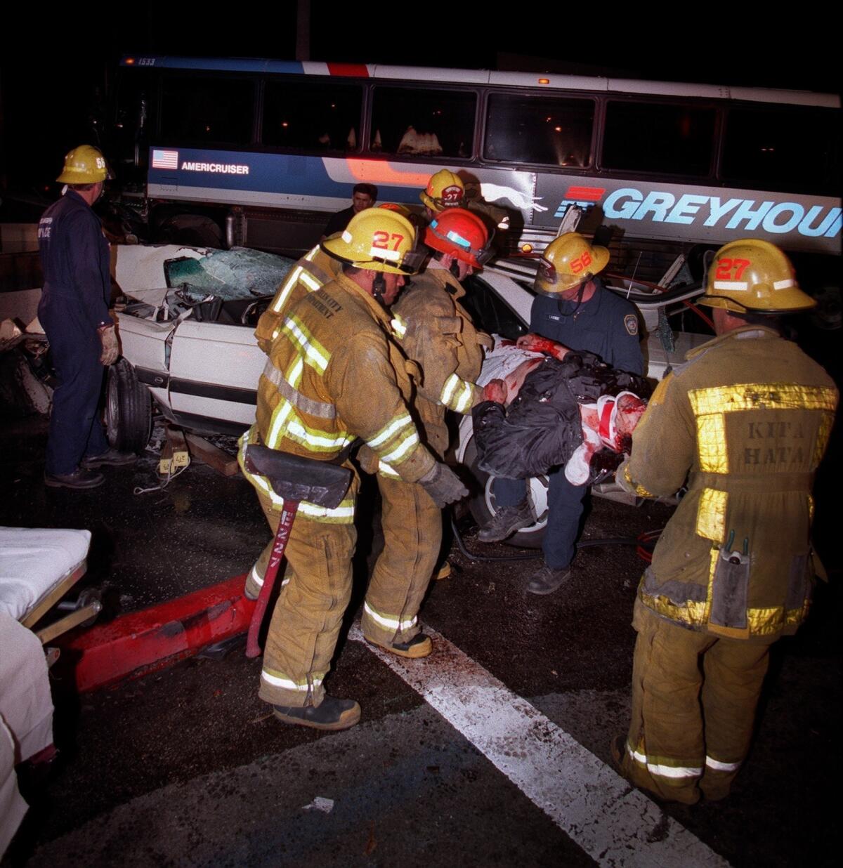 One person died and over a dozen people were injured after a hit-and-run driver crashed his car into a Greyhound bus at the intersection of Sunset Boulevard and Vine Street in Hollywood.