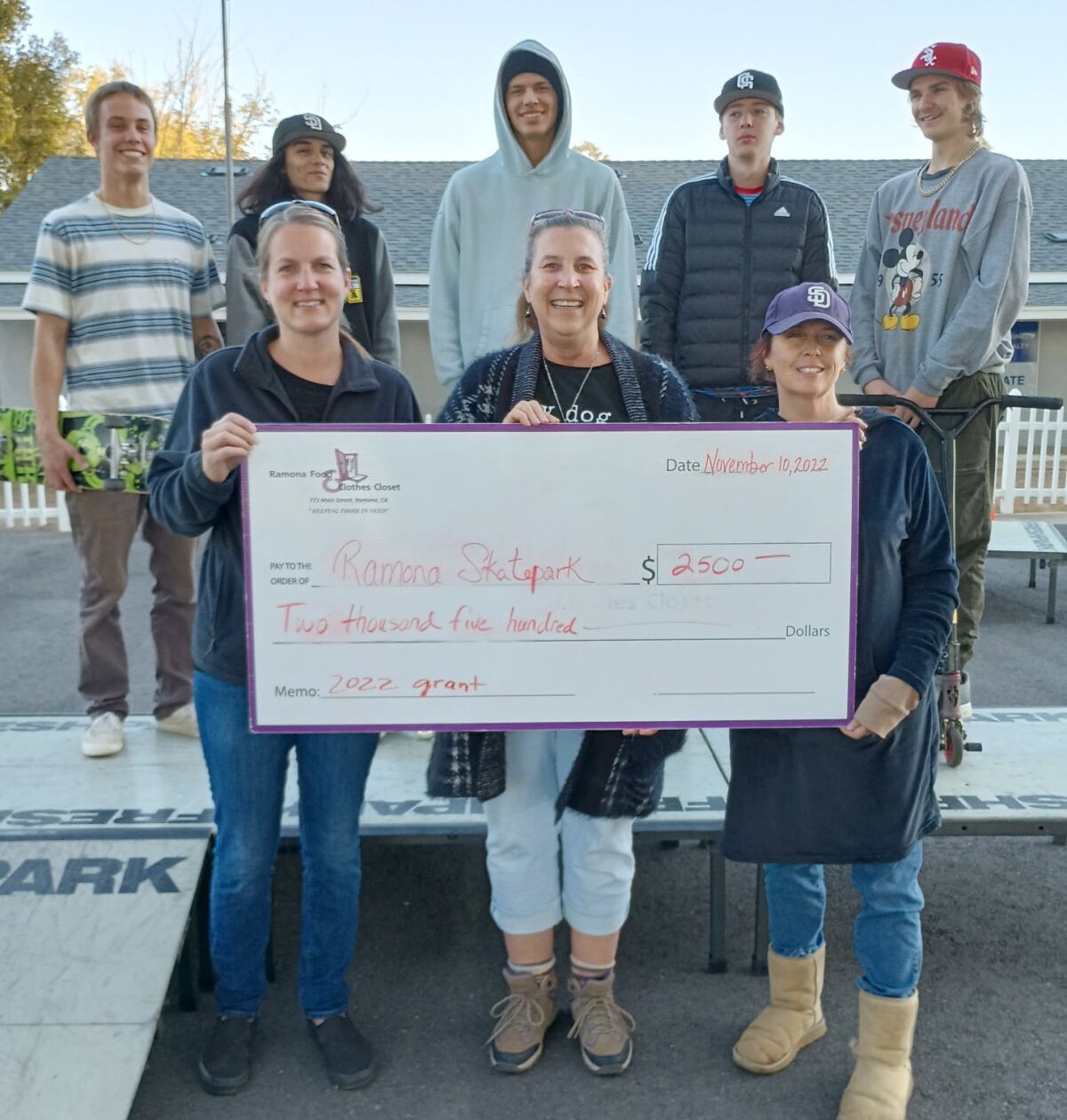 Ramona Skatepark Champions representatives accept a $2,500 grant from Ramona Food & Clothes Closet.