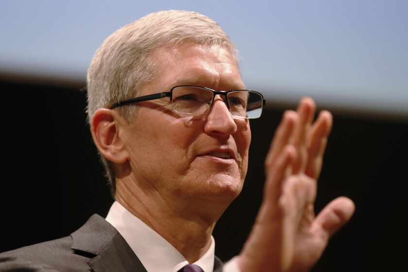 Apple CEO Tim Cook speaks in Milan, Italy, on Nov. 15. Cook has vowed to fight a court order compelling the tech company to help the FBI defeat security measures on a phone belonging to the San Bernardino shooters.