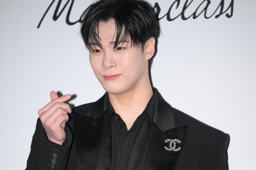 outh Korean singer MoonBin of ASTRO attends the photocall for the CHANEL Parfumeur Masterclass in January.
