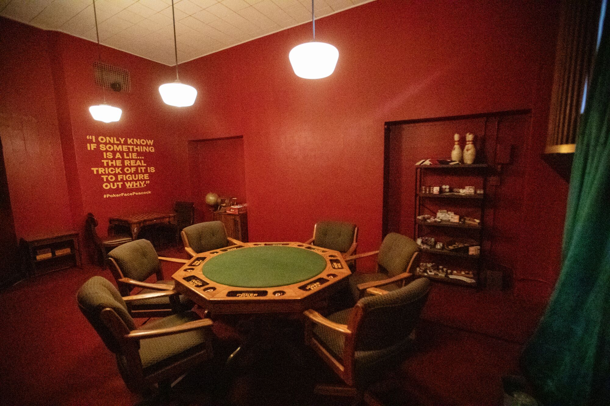 An octagonal card table and six chairs
