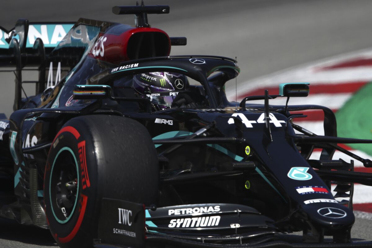 Mercedes driver Lewis Hamilton of Britain steers his car during a practice session prior to the Formula One Grand Prix at the Barcelona Catalunya racetrack in Montmelo, Spain, Saturday, Aug. 15, 2020. (Bryn Lennon, Pool via AP)