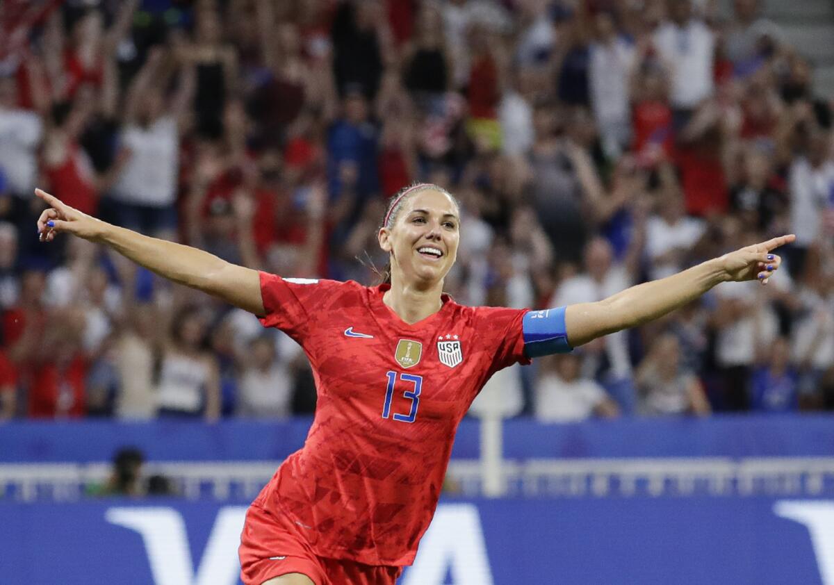 Alex Morgan celebrates after scoring during a World Cup semifinal against England on July 2, 2019.