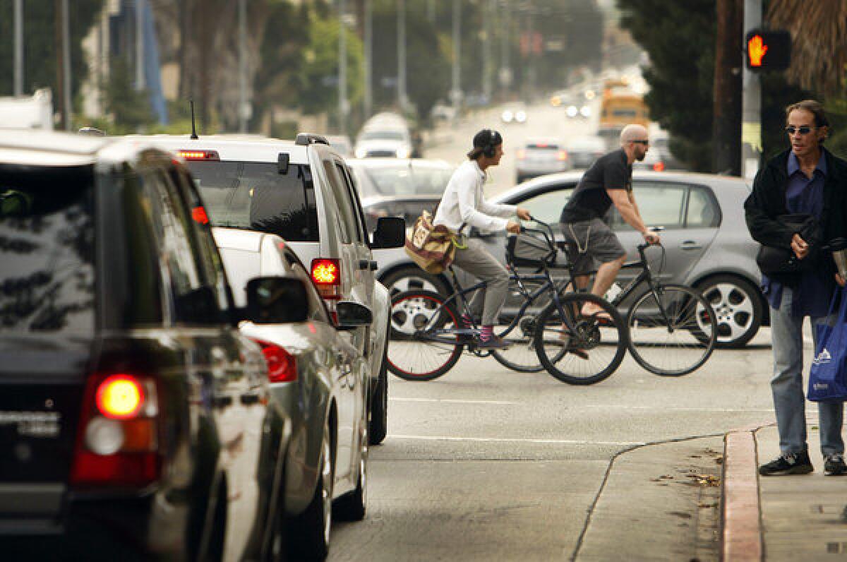 A new state law requires motorists to give bicyclists a 3-foot buffer on roadways. Above, the intersection of Bundy Drive and Idaho Avenue in West Los Angeles.