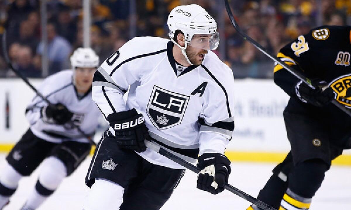Kings center Mike Richards, who is mired in a season-long scoring slump, practiced on the team's fourth line on Friday.