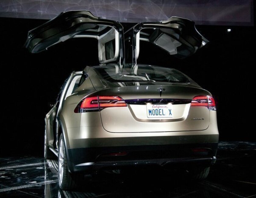 Tesla Motors Plans To Debut Cheaper Car In Early 2015 Los