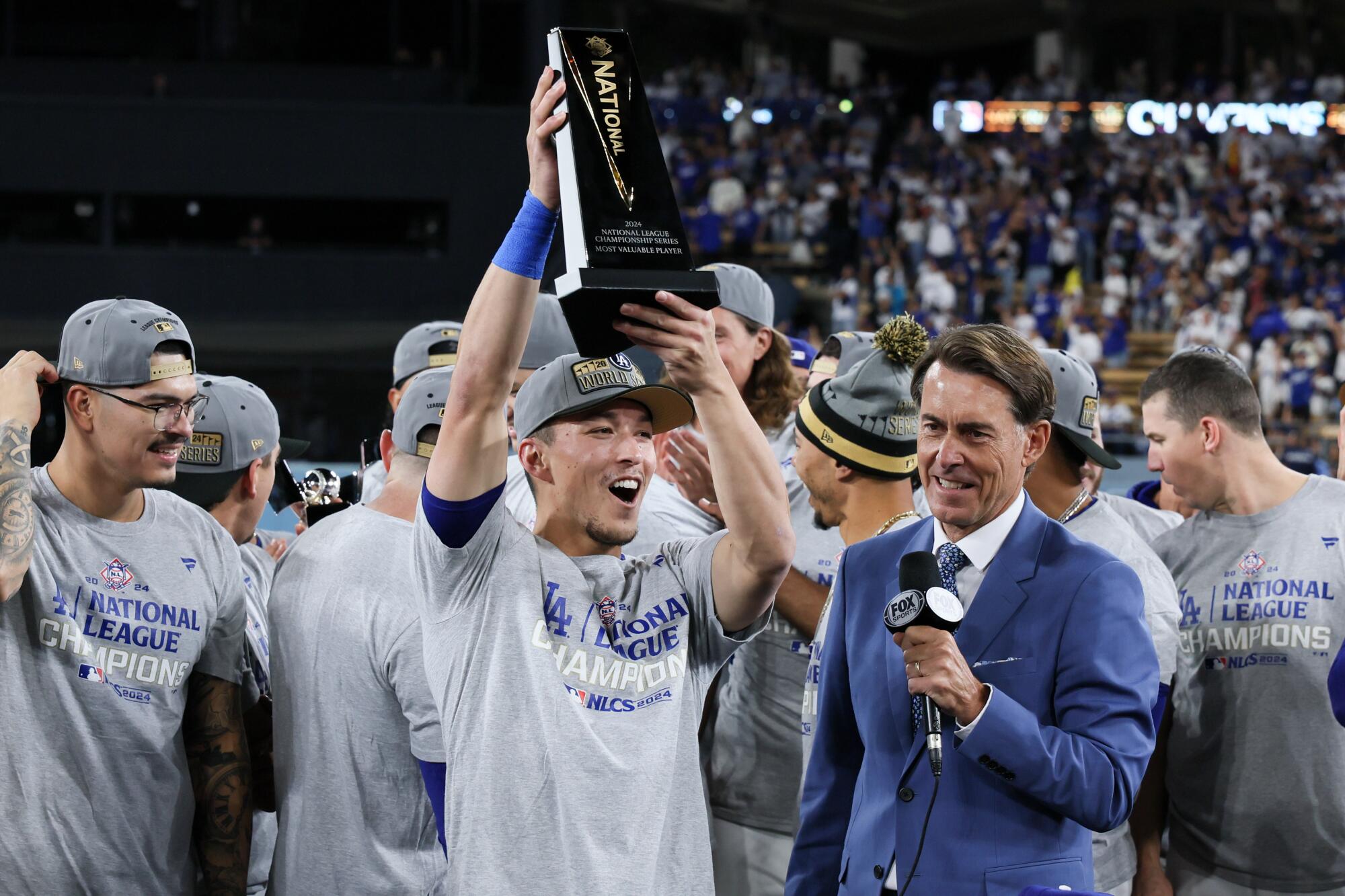 Dodgers shortstop Tommy Edman celebrates after being awarded MVP of the National League Championship Series.