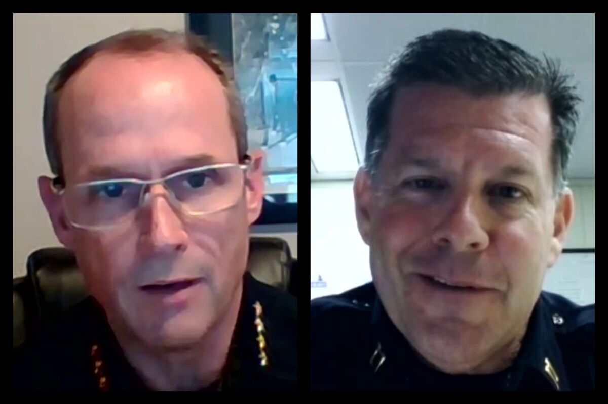 San Diego Police Chief David Nisleit (left) and Northern Division Capt. Scott Wahl speak Sept. 9.