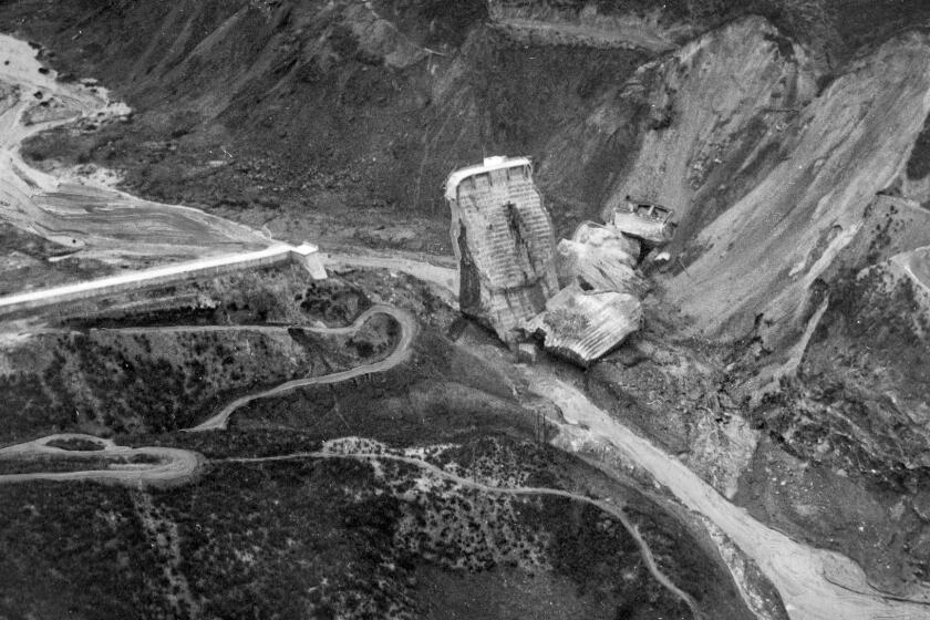 Mar. 13, 1928: Aerial photo of the wrecked St. Francis Dam taken from the air at a point just below the dam. This photo was published on page one of the March 14, 1928, Los Angeles Times.