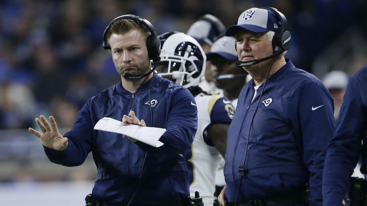 Rams head coach Sean McVay motions to his team with defensive coordinator Wade Phillips, right, during the second half against the Detroit Lions on Dec. 2, 2018, in Detroit.