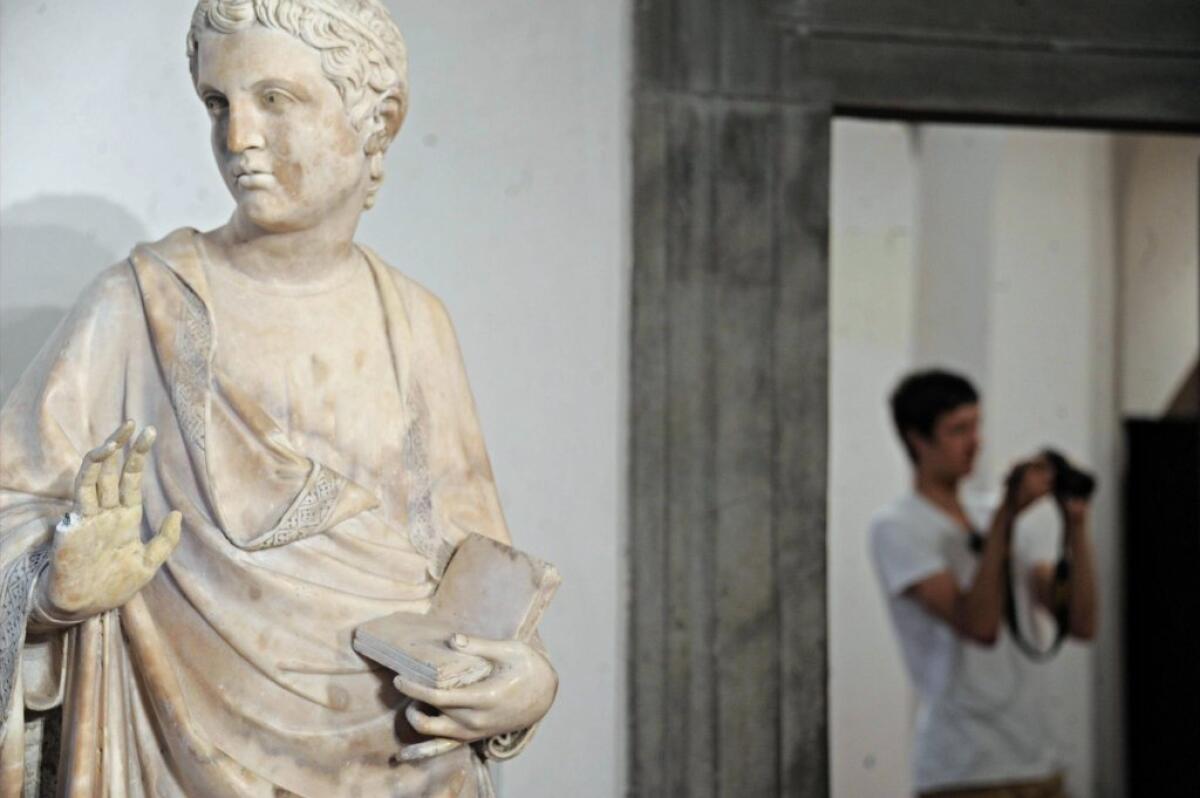 A statue by Florentine sculptor Giovanni d'Ambrogio lost a finger after it was reportedly broken off by an American tourist.