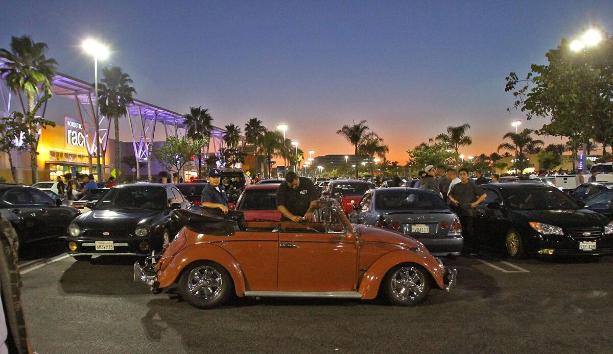 A Volkswagen convertible on display at the Empire Center in Burbank during a gathering of car enthusiasts on Tuesday, Aug. 13, 2013.