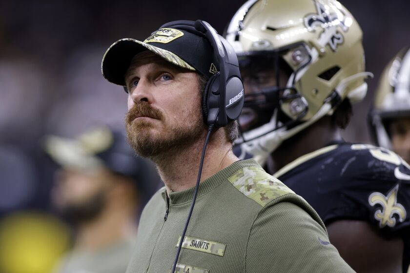 FILE - New Orleans Saints defensive line coach Ryan Nielsen reacts to a call during the team's NFL football game against the Atlanta Falcons, Nov. 7, 2021, in New Orleans. The Atlanta Falcons found their new defensive coordinator from an NFC South rival's coaching staff on Friday, Jan. 27, 2023, by hiring Nielsen, the former Saints' co-defensive coordinator. Nielsen replaces Dean Pees, who retired on Jan. 9. (AP Photo/Tyler Kaufman, File)