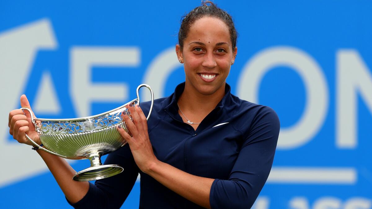 Madison Keys poses with the winner's trophy Sunday in Birmingham, England.